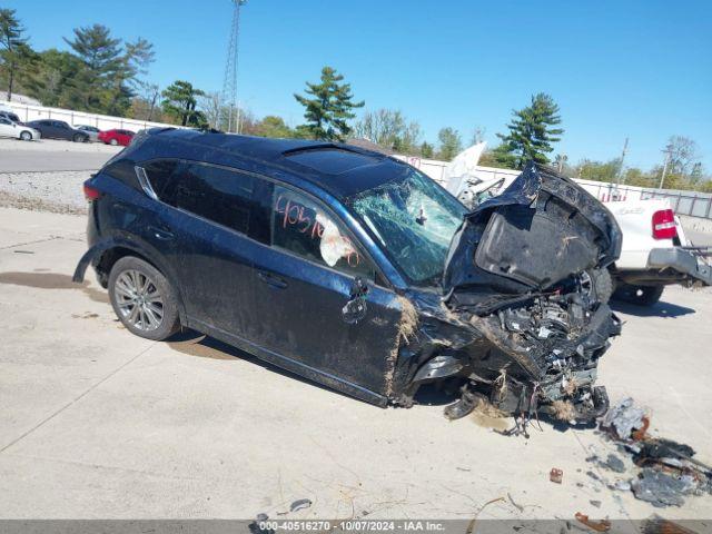  Salvage Mazda Cx