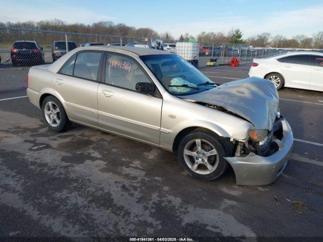  Salvage Mazda Protege